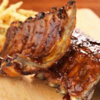 Baby Back Ribs · Wood-Fired, Salt Creek Grille BBQ Sauce Seasoned Asiago Garlic Waffle Fries.
(Substitute One...