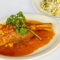 Baghali Polo · Basmati rice seasoned with herbs, lima beans and fresh dill served with lamb shank.
