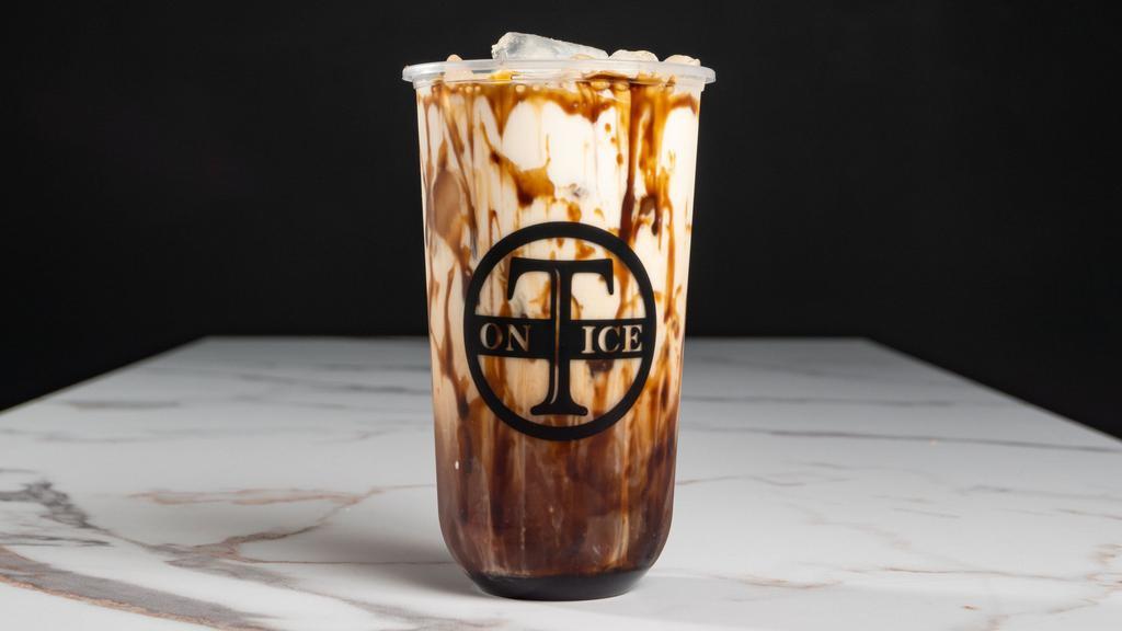 Tiger Bomb · House black milk tea with boba and brown sugar stripes along the cup