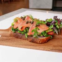 Smoked Salmon Tartine · Open  faced sandwich, arugula tomatoes, red onions,capers, dills, cream cheese.