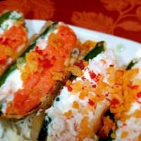 Jalapeño Poppers · Fried jalapeño stuffed with cream cheese and spicy tuna.