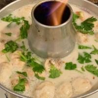 Tom Kah · Choice of protein in a delightful coconut milk soup with lemongrass, Thai herbs, red onion, ...