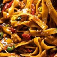 Spicy Basil Pasta · Stir-fried linguine with choice of protein, basil, bamboo shoot, onion, and bell peppers in ...