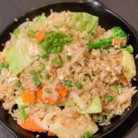 Veggie Fried Rice · Jasmine fried rice with broccoli, cabbage, peas, carrot,	onion, and egg. Additional choice o...