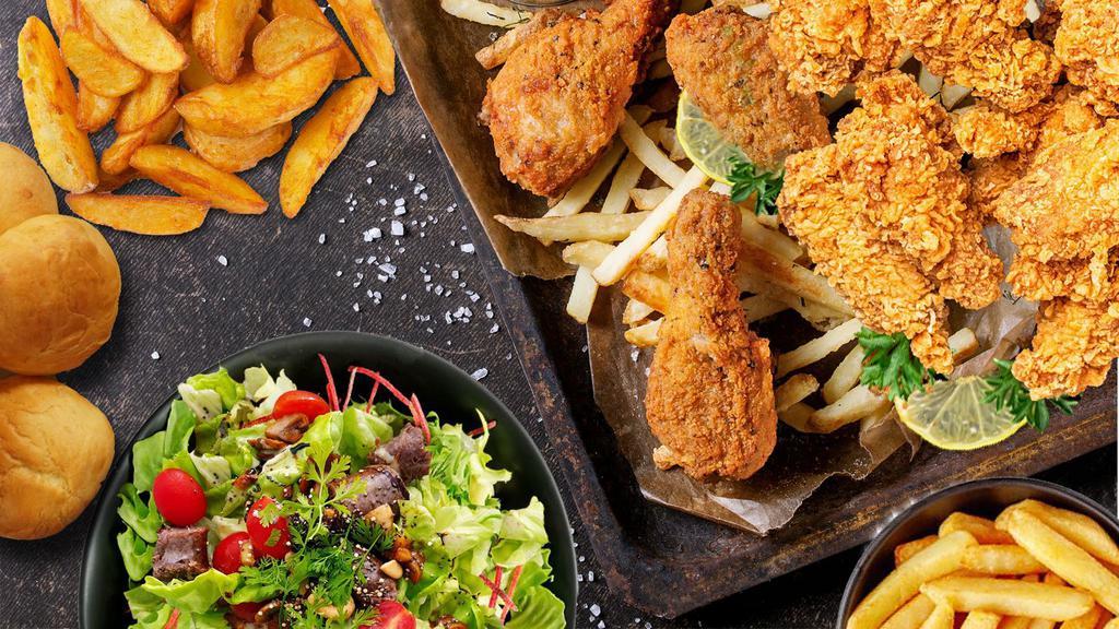 Chicken Bundle #1 · Eight pieces fried chicken prepared to perfection served with two orders of potato wedges or fries, two rolls and one salad of your choice.