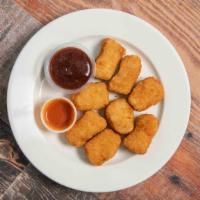 Chicken Nuggets · 8 pieces of vegan chicken nuggets. Comes with side of bbq sauce and buffalo sauce.