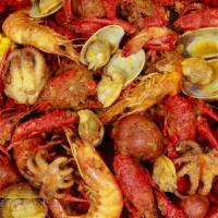 1 Lobster Tail & Choose 3 Lbs · Crawfish, shrimp, baby octopus, Manila clam, green mussels. Includes corn (2 pieces), baby p...