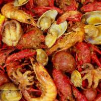 1 Lobster Tail & Choose 4 Lbs · Crawfish, shrimp, baby octopus, Manila clam, green mussels. Includes corn (3 pieces), baby p...