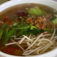 Roasted Duck Noodle Soup · Each bowl is served with chewy noodles, baby bok choy, and chopped roasted duck. Topped with...