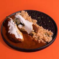 Chile Relleno  · Vegetarian. Delicious poblano pepper (green pepper) stuffed with queso tropical (cheese) and...