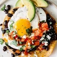 Huevos Rancheros · Two eggs sunny side up, served on tortillas with your choice of salsa verde (green) or salsa...