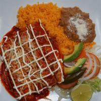 Enchiladas Suizas · Salsa Roja o Verde servidas con arroz, frijol, y ensalada.
Red or green sauce served with ri...