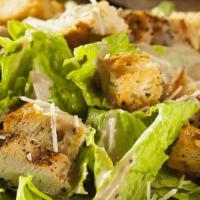 Caesar Salad · Romaine Lettuce with caesar dressing, parmesan cheese, and croutons