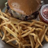 Classic Burger · House sauce, grilled onion, lettuce, tomato,  cheddar cheese, pickle, and bagnat bun. Side o...