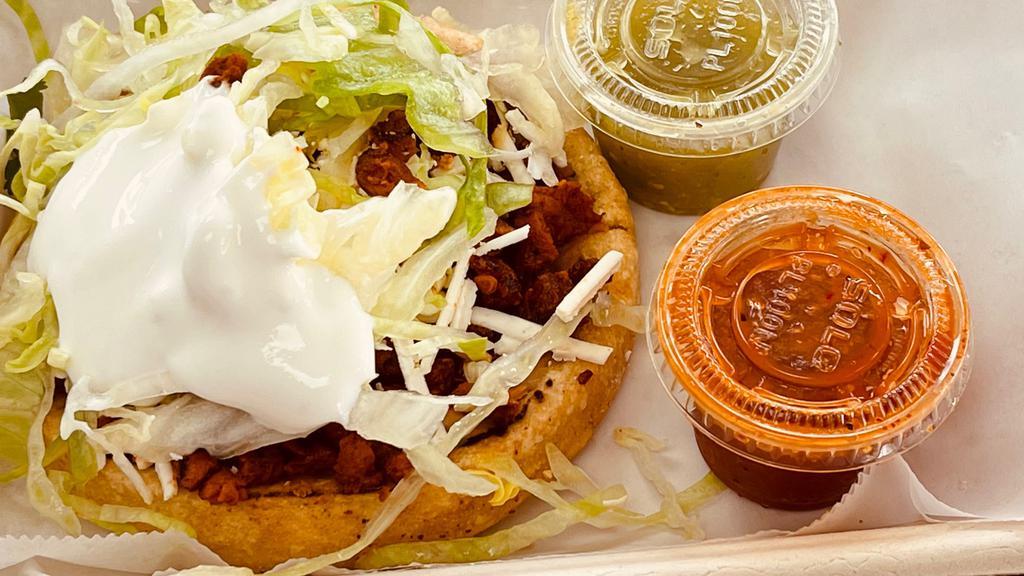 1 Sope · W/Beans,Meat, Cotija Cheese , Lettuce and Sour Cream.