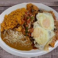 #11 Chilaquiles - Meat · With your choice of egg, meat