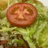 Taco Salad · With rice, beans, guacamole, cheese, lettuce, sour cream, meat.