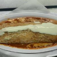 Super Wet Burrito · With Rice, Beans, Cheese, Guacamole, Sour Cream, Pico De Gallo , Meet and Salsa on the top.