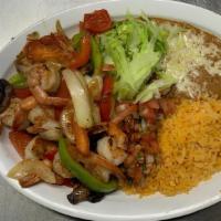 Shrimp Fajitas Plate · Rice, beans, pico de gallo, guacamole, sour cream, lettuce and tortillas