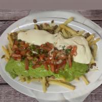 Steak Fries · French Fries, steak, guacamole, sour cream, pico de gallo . Your choice of nacho cheese or s...