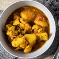 Aloo Gobi · Fresh cauliflower and potatoes cooked with herb and spices.