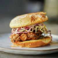 Fried Chicken Sandwich
 · With butter pickles and southern slaw on a potato bun – choice of crispy or nashville spiced.