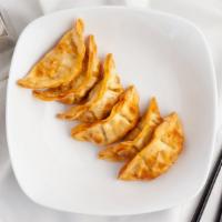 Gyoza (6 Pieces) · Fried Dumplings with Pork and Vegetables. Served with Ponzu Sauce