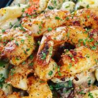 Cajun Stacked ( 1/2 Portion) · Chicken, Sausage, Shrimp, Cajun Alfredo, Red-Yellow-Green Bell Peppers, Tomato, Onion,