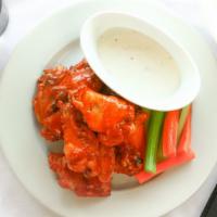 7 Piece Hot Wings · Served with celery sticks, carrots and ranch dressing or blue cheese. Sauces: Buffalo, BBQ o...
