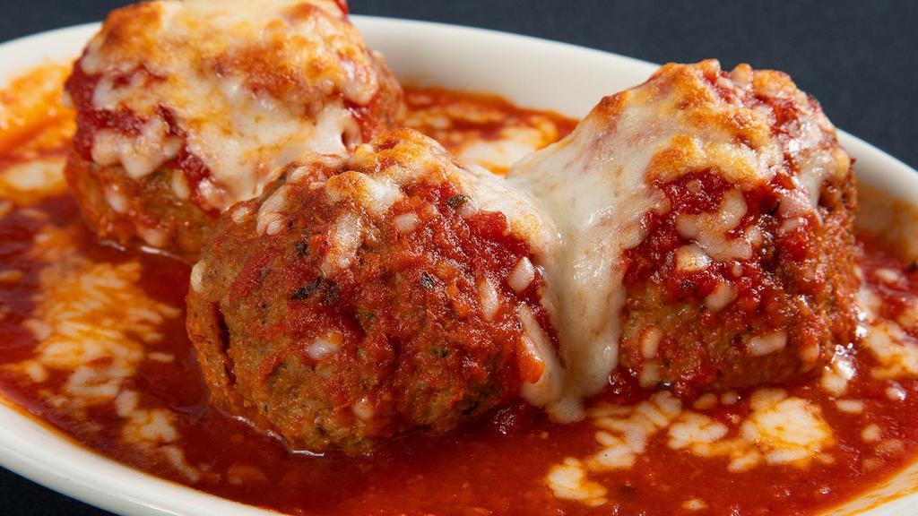 Meatballs · Served in marinara sauce and mozzarella cheese.
