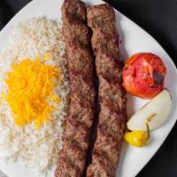 Beef Koobideh - Ground Beef Plate · Enjoy two skewers of ground beef kabob with warm basmati rice and grilled onions, green pepp...
