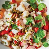 Ceviche · Shrimp, cucumber, red onion, cilantro, serrano chilles in lime and tomato juice. Tortilla Ch...