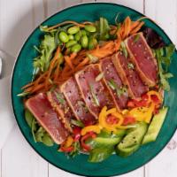 Seared Ahi Tuna Salad · Mixed greens with arugula, seared ahi tuna, shallots, cucumber, edamame, carrots, bell peppe...
