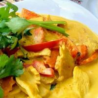 Curry Rice · Spicy, Vegan. With sautéed red chili paste and coconut milk, bamboo shoots, bell peppers, ta...