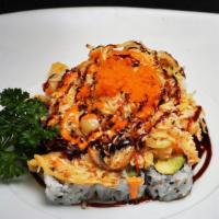 Dynamite Roll (9Pc) · Spicy. Baked scallop, mushroom, crab meat, yellow onion, mixed on top avocado, cucumber, dyn...