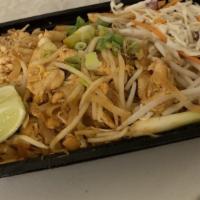 Pad Thai · Stir-fried thin rice noodles with egg, scallion, green onion, bean sprouts, lime and ground ...