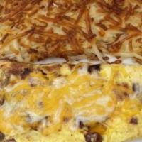 Meat Lovers Omelet · Ham, bacon, sausage and linguica topped with Cheddar and Jack.
