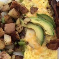 Lodi Omelet · Bacon, bell peppers, onions and cheese topped with avocado slices and sour cream on the side.