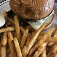 Mushroom Swiss Burger · Served with mayonnaise lettuce onion tomato and a pickle spear. choice of sides: french frie...