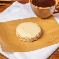 Alfajor · Traditional Argentinian Cookie Sandwich With Dulce de Leche & Shaved Coconut.