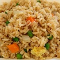 Fried Rice · Fried rice with egg, white onion, peas and carrots.