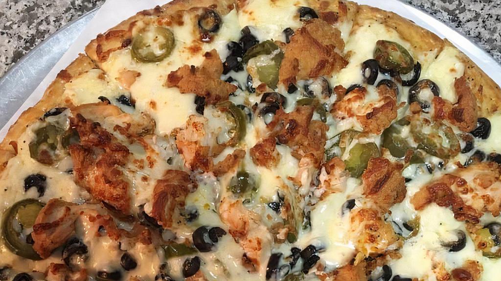 Cajun Chicken Pizza
 · Alfredo Sauce, Cajun Chicken, jalapeno, Black Olive, Garlic butter  ,and extra cheese.