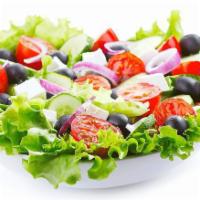 Greek Salad · Fresh tomatoes, red onion, feta cheese, cucumber, kalamata olives and olive oil.