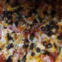 Combo Pizza · Includes pepperoni, sausage, mushrooms, and peppers.