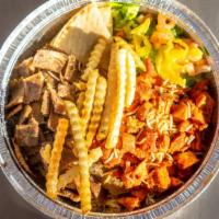 Habibi'S Platter · The Habibi way -  A mix of our authentic lamb and chicken served with Rice, salad, pita slic...