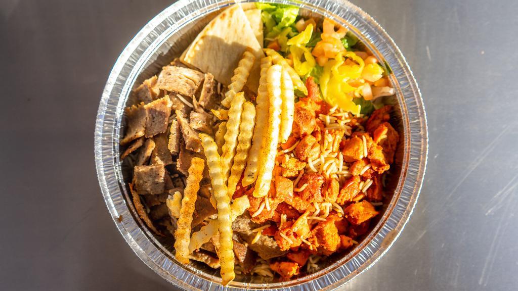 Habibi'S Platter · The Habibi way -  A mix of our authentic lamb and chicken served with Rice, salad, pita slices on the side topped off with homemade tzitiki sauce, white sauce and hot sauce.