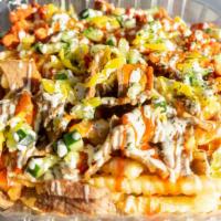 Habibi'S Fries · The Habibi way -  A mix of our authentic lamb and chicken served on Fries with lettuce, cucu...
