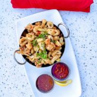 Salt & Pepper Calamari · tubes, tentacles, bell pepper and jalapeno - battered and fried with sides of sweet chili sa...