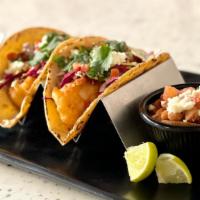 Crispy Fish Tacos · guajillo salsa, pico, queso fresco, lime slaw, cilantro, side of pinto beans