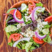 Greek Salad · Mixed greens, fresh Roma tomatoes, cucumber, feta cheese, Greek olives, red onion.